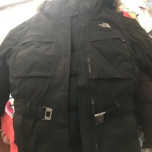 A black north face coat